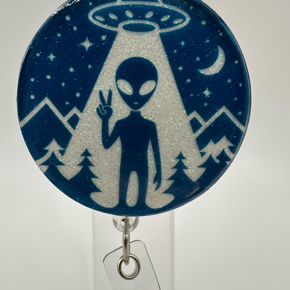 Alien UFO Badge Reel
